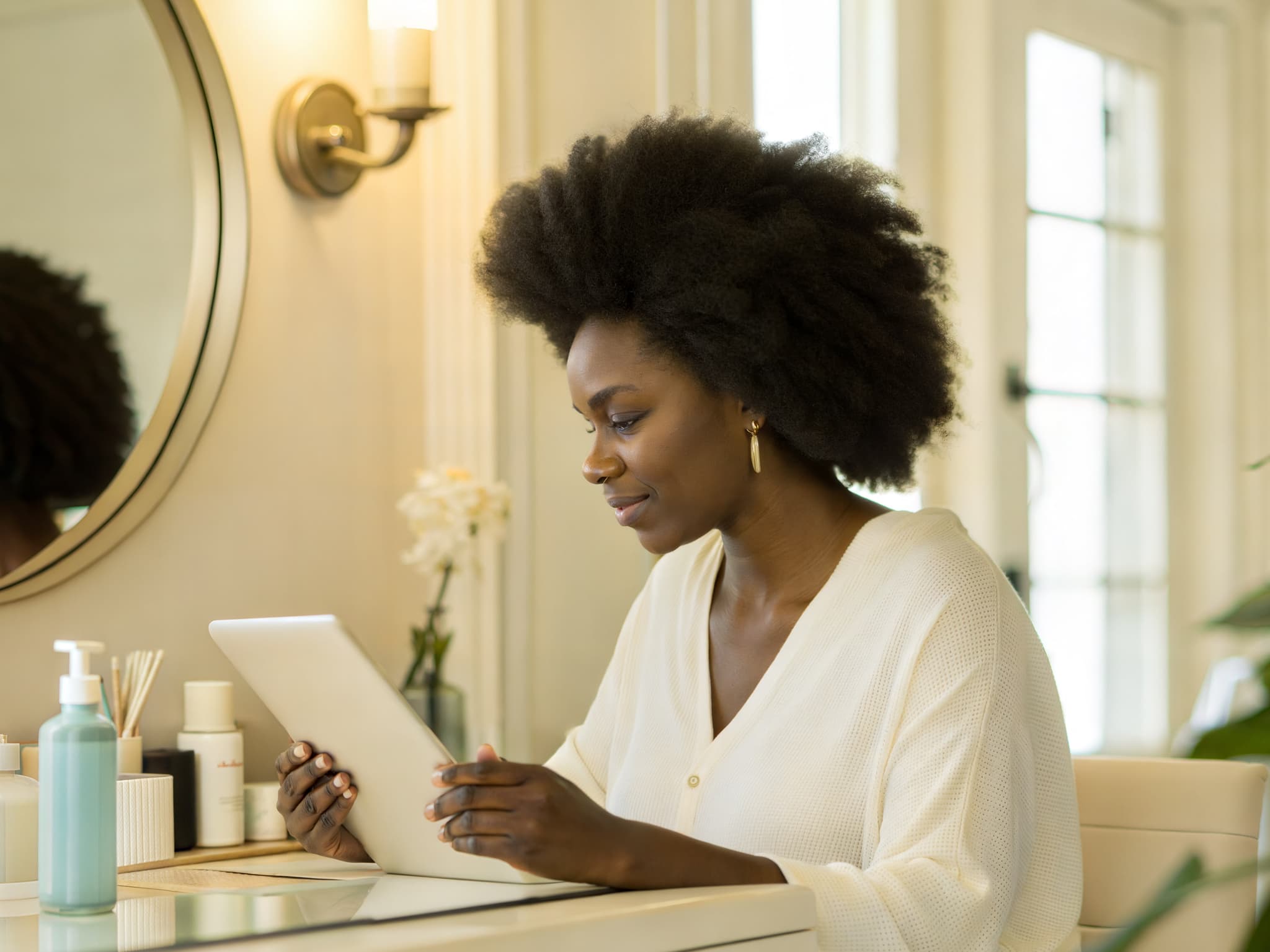Woman with beautiful textured hair at a vanity